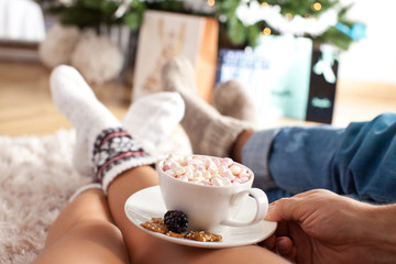 Couple spending Christmas together at home