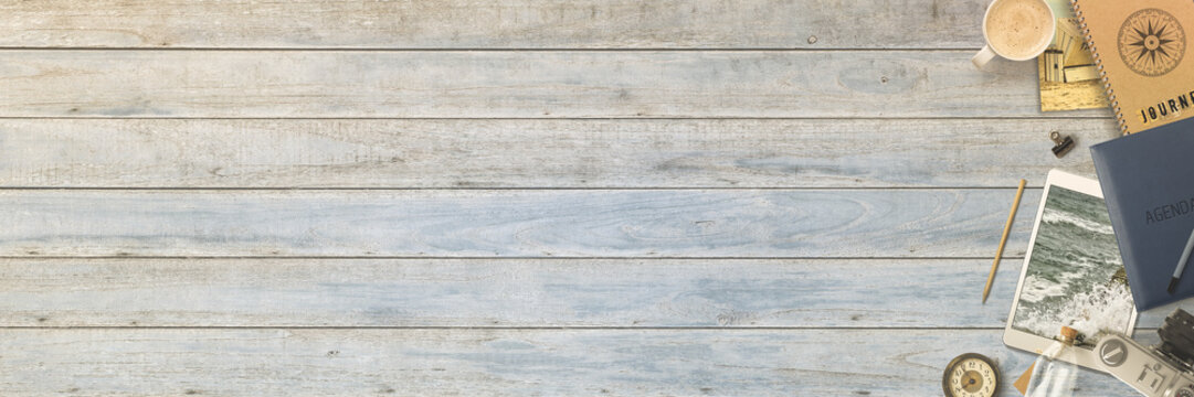 Preparing travel - retro and modern items on maritime wood board - banner / backround 