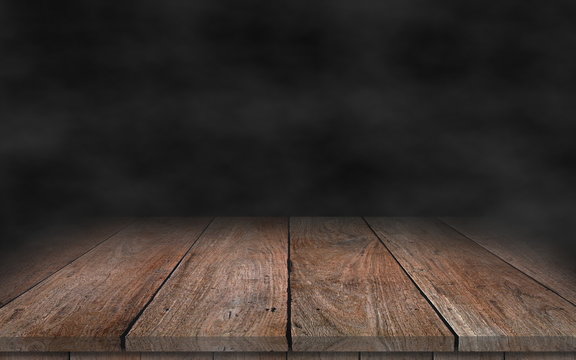 Old wood plank with smoke in the dark background.