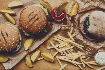 Fast food take away top view. Hamburger, hotdog and fries