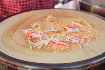 Freshly made Crepe on a hot plate.
