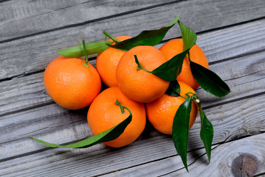 Group of tangerines on table