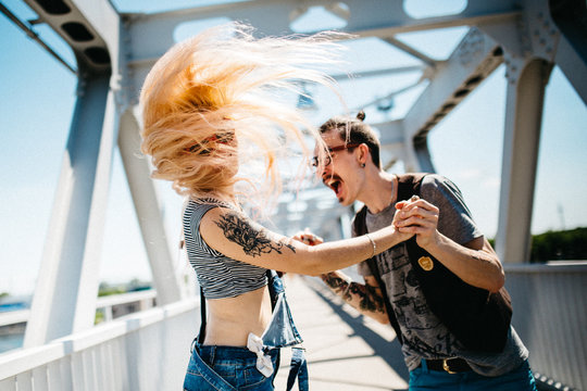 Hipster couple in summer day. wearing sunglasses.