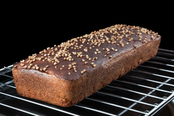 Freshly baked Borodinsky bread. Traditional Russian rye-wheat bread with coriander, malt and molasses