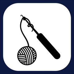 An icon on crotchet and threads for creating handmade knitting goods
