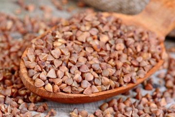 Wooden spoon with buckwheat