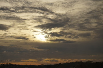 Fototapeta na wymiar Sun behind Clouds