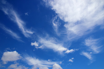 Beautiful white clouds with blue sky background