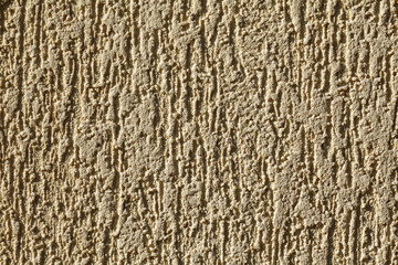 The surface of the facade of plastic mortar