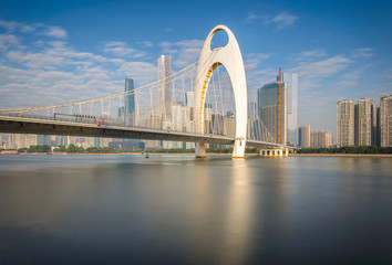 Modern bridge in Zhujiang River and modern building of financial district in guangzhou city, China