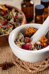 alternative therapy with essential oils and dried herbs