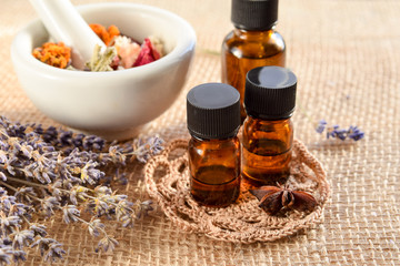 alternative therapy with essential oils and dried herbs
