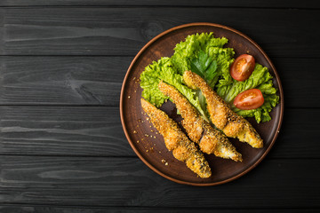 Tasty baked fish on plate