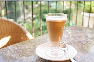 latte coffee, hot latte coffee, a glass of layered coffee