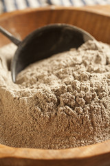 buckwheat flour in a wood bowl