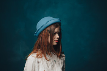 Naklejka premium Woman with blue hat