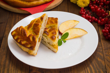 Slice of mouth watering rustic apple pie. Top view. Close-up