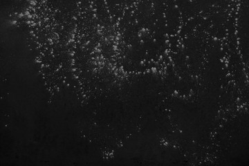 Chalk rubbed out on blackboard