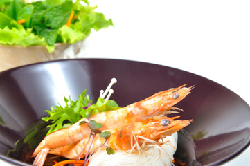 Boiled shrimps with thin rice noodles and vegetables