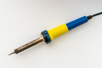 Electric soldering iron, close-up / Electric soldering iron for miniature works on white background