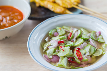 Grilled chicken satay with peanut sauce and vinegar of vegetable