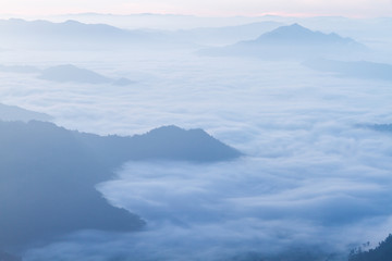 Fototapeta na wymiar Fog with cloud mountain valley and sunrise landscape