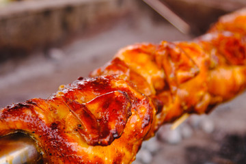 Free range chicken for roasting traditional at street food vendor market , thai local food. Selective focus.