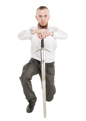 Young handsome man with sword isolated