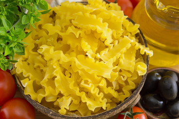 Bow tie farfalle pasta in a bowl with vegetables