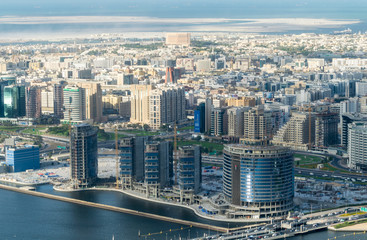 Fototapeta na wymiar Dubai old and modern buildings, aerial view