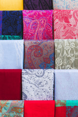 Store tissue. Background with different multicolor handmade fabr