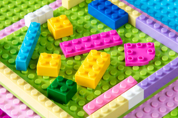 Baseplate with colorful plastic building blocks