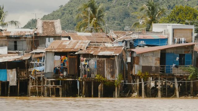 Slums in Nha Trang. Houses on the river.