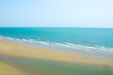 Fototapeta na wymiar Blue sky,blue sea, with sand on the beach . view from mountain at Hua Hin beach.