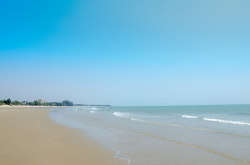 Fototapeta na wymiar The Hua Hin beach on blue sky background. In summer