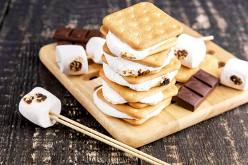 Smores on wooden background
