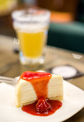 vanilla crape cake with strawberry sauce in cafe..