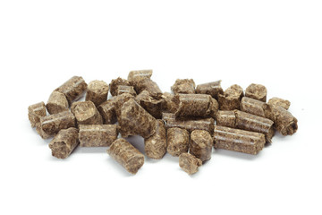 stack of wooden pellets for bio energy, white background, isolated