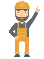 Worker in hard hat pointing up with finger.