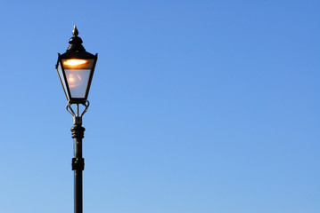Street Light left on during the day