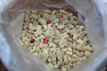 Natural aromatic incense Frankincense isolated in to a white bag