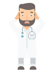 Scared doctor clutching his head.