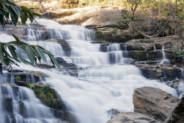 Obraz premium Waterfall in rainforest at northern of Thailand.
