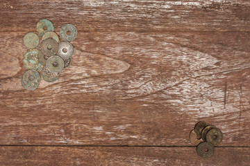 Vintage coin thailand on the wood desk background