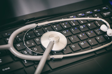 Stethoscope on a keyboard