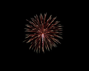 Fireworks of various colors isolated on black background
