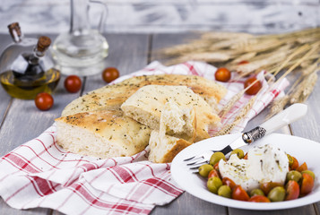 Italian focaccia with onion and basil