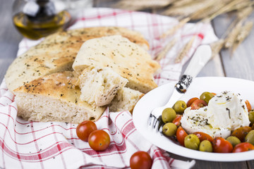 Italian focaccia with onion and basil