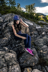 Young woman enjoying the sunny day in Norway