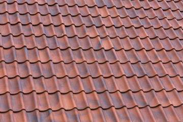 Red tiles roof background